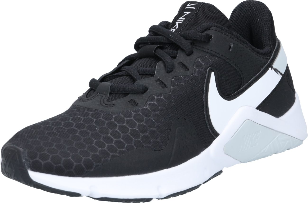 NIKE Sportovní boty 'Legend Essential 2' černá / bílá
